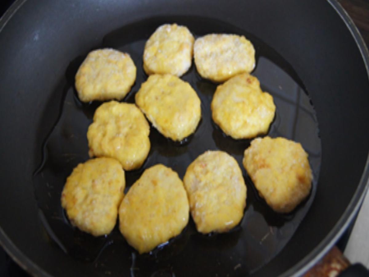 Chicken Nuggets mit Honig-Bundmöhren und bunten Reis - Rezept - Bild Nr. 16249