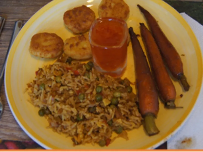 Rezept: Chicken Nuggets mit Honig-Bundmöhren und bunten Reis Bild Nr. 16255 Chicken Nuggets mit Honig-Bundmöhren und bunten Reis - Rezept - Bild Nr. 16255