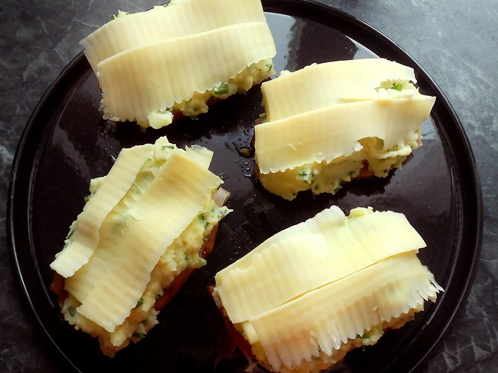 Gratinierte Kassler-Steaks mit jungen Erbsen - Rezept - Bild Nr. 16295