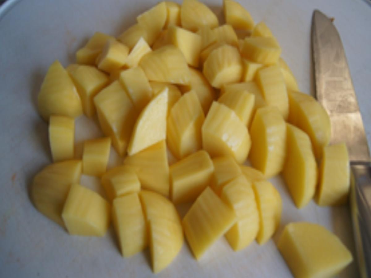 Seelachsfilet in Kartoffelpanade mit Gurkensalat und cremigen Kartoffelstampf - Rezept - Bild Nr. 12