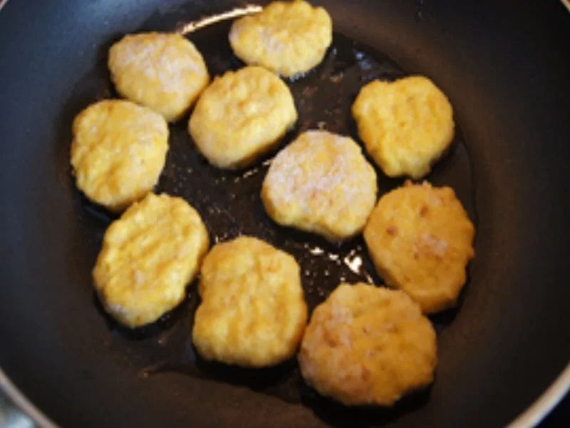 Rezept: Chicken Nuggets mit Zuckerschoten und Curry-Nudeln Bild Nr. 4 Chicken Nuggets mit Zuckerschoten und Curry-Nudeln - Rezept - Bild Nr. 4