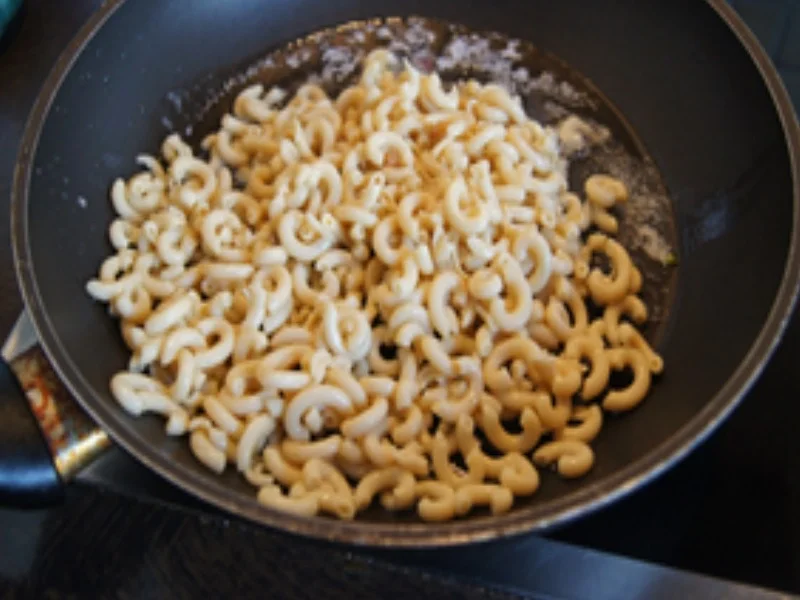 Rezept: Chicken Nuggets mit Zuckerschoten und Curry-Nudeln Bild Nr. 8 Chicken Nuggets mit Zuckerschoten und Curry-Nudeln - Rezept - Bild Nr. 8