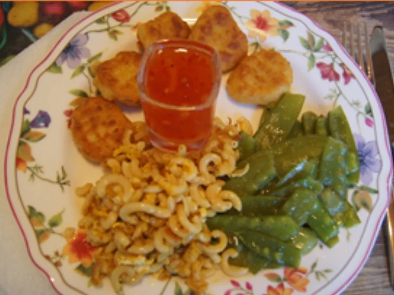 Rezept: Chicken Nuggets mit Zuckerschoten und Curry-Nudeln Bild Nr. 10 Chicken Nuggets mit Zuckerschoten und Curry-Nudeln - Rezept - Bild Nr. 10
