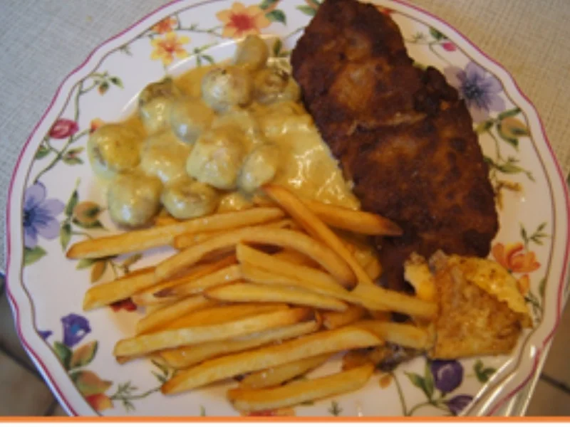 Rezept: Schweineschnitzel mit Curry-Rahm-Champignons und Pommes Frites Bild Nr. 10 Schweineschnitzel mit Curry-Rahm-Champignons und Pommes Frites - Rezept - Bild Nr. 10
