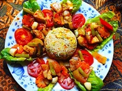 Gemüsepotpourri mit Huhn serviert mit Mandarinreis - Rezept - Bild Nr. 16314