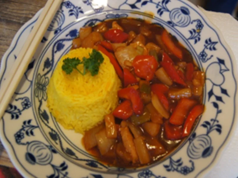 Hähnchen mit Gemüse süß-sauer und gelber Basmatireis - Rezept - Bild Nr. 16402