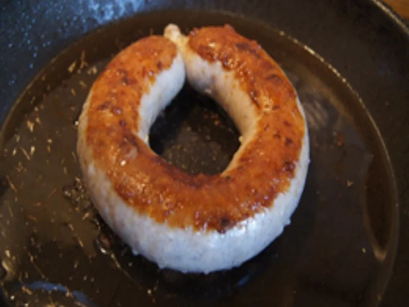 Brägenwurst mit gebratenen Spitzkohl und Drillingen - Rezept - Bild Nr. 5