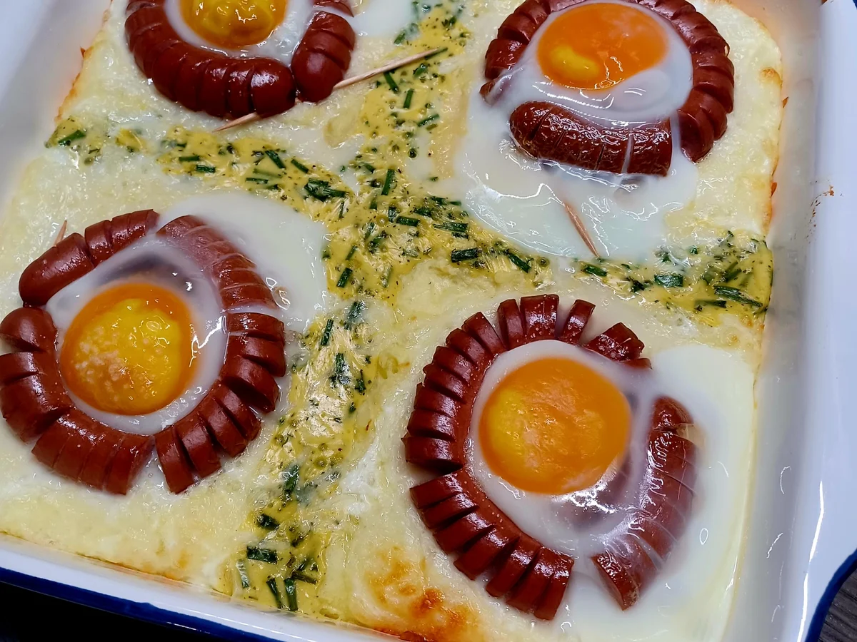 Kartoffelauflauf mit Würstchen und Ei - Rezept - Bild Nr. 16412