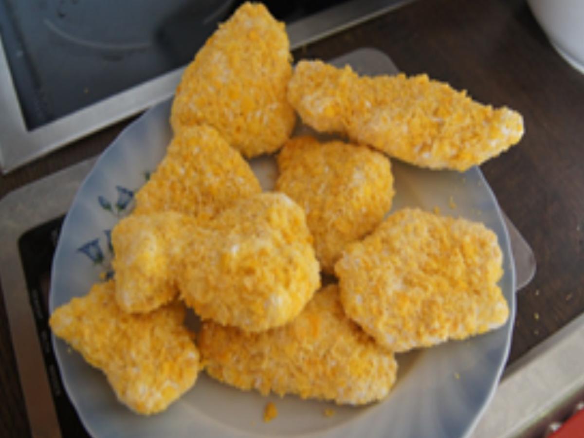 Crispy-Chicken-Nuggets mit Honig-Möhren-Sticks und Sellerie-Parmesan-Kartoffelcreme - Rezept - Bild Nr. 16466