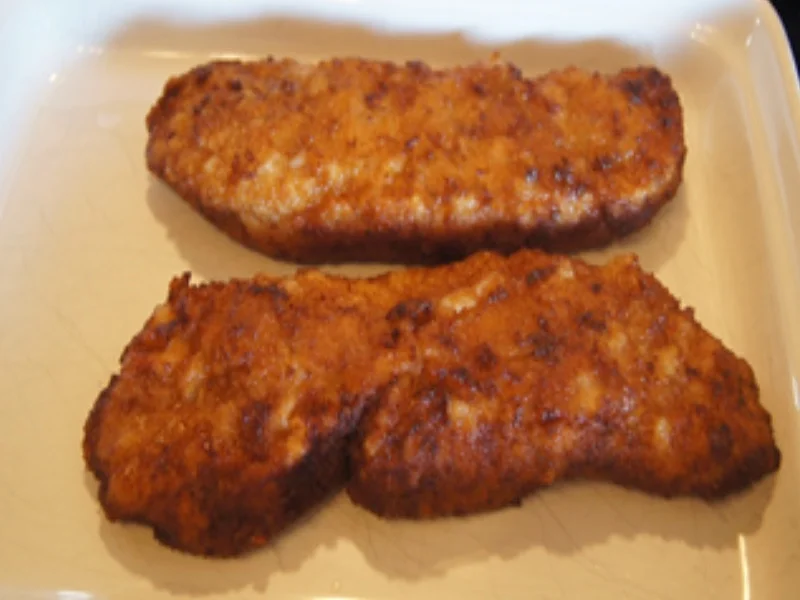 Paniertes Schweinesteak mit Bundmöhren und Sellerie-Kartoffel-Stampf - Rezept - Bild Nr. 16477