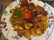 Rahm-Porree-Gemüse mit Mini-Schnitzeln und herzhaften Bratkartoffeln - Rezept - Bild Nr. 2