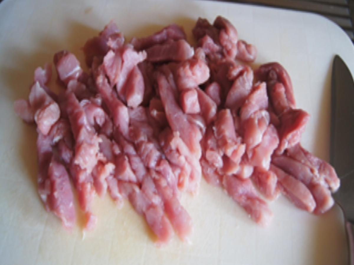 Schweinefiletstreifen mit Paprika-Zwiebel-Streifen im Wok mit gelben Basmatireis - Rezept - Bild Nr. 4