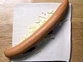 Würstchen im Schlafrock mit Käse - Rezept