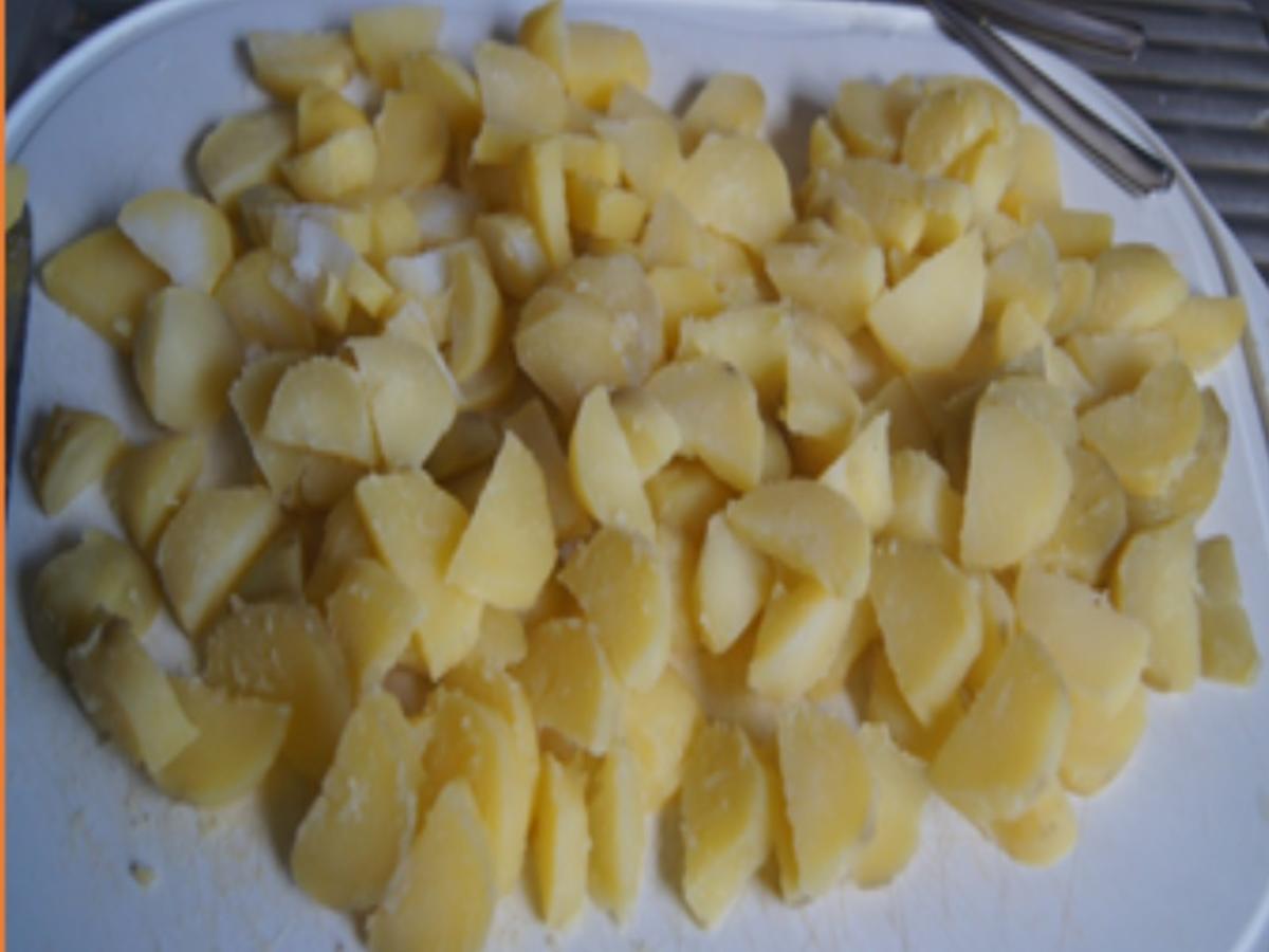 Matjesfilet mit leckeren Bratkartoffeln und Gurkensalat - Rezept - Bild Nr. 8