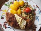 Paniertes Nackenkotelett mit Rahm-Wirsing und Drillingen - Rezept - Bild Nr. 2