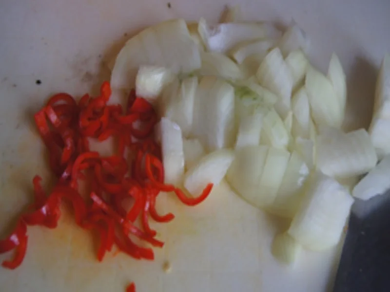 Rezept: Paniertes Nackenkotelett mit Rahm-Wirsing und Drillingen Bild Nr. 8 Paniertes Nackenkotelett mit Rahm-Wirsing und Drillingen - Rezept - Bild Nr. 8