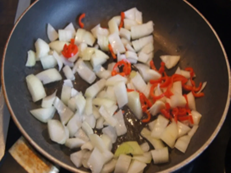 Rezept: Paniertes Nackenkotelett mit Rahm-Wirsing und Drillingen Bild Nr. 9 Paniertes Nackenkotelett mit Rahm-Wirsing und Drillingen - Rezept - Bild Nr. 9