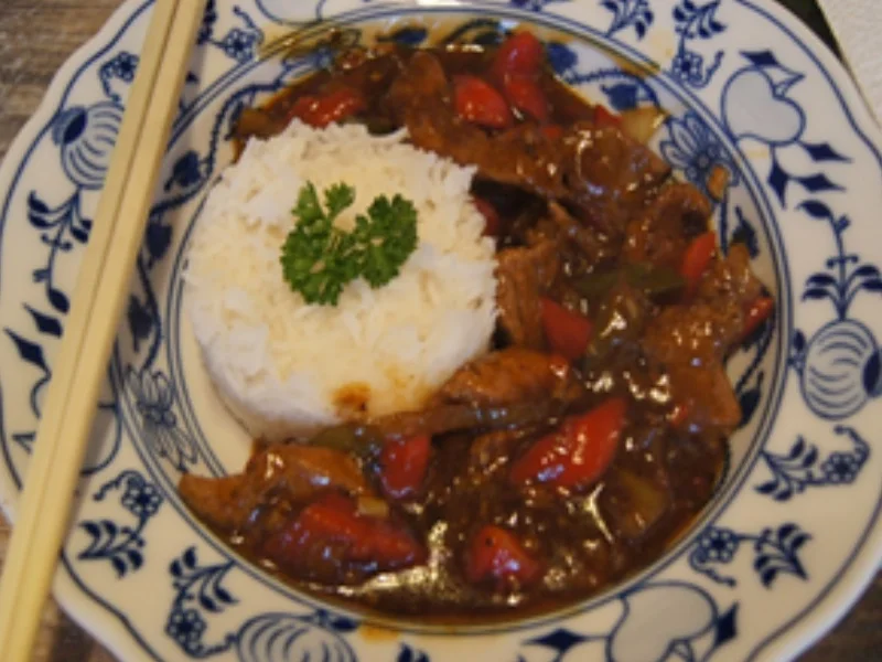 Schweinefilet mit Zwiebel-Paprika-Gemüse und Basmatireis - Rezept - Bild Nr. 16901