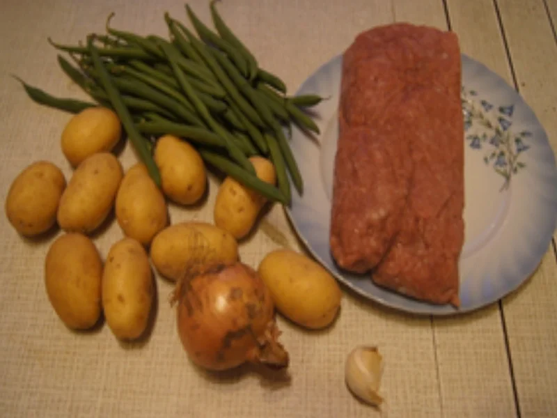 Rezept: Pellkartoffel-Drillinge mit Putenhack-Stippe und Kenia-Bohnen Bild Nr. 16930 Pellkartoffel-Drillinge mit Putenhack-Stippe und Kenia-Bohnen - Rezept - Bild Nr. 16930