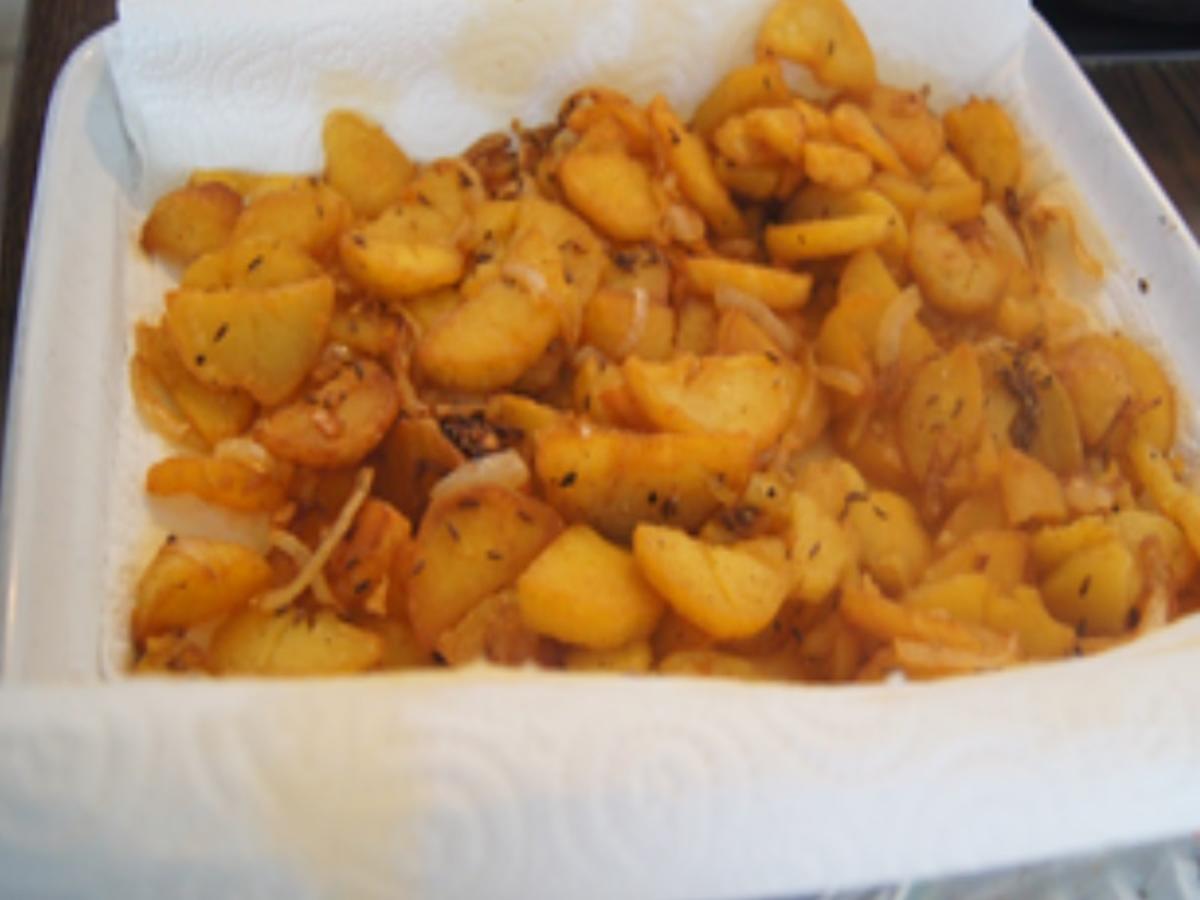 Schweinskopfsülze mit herzhaften Bratkartoffeln - Rezept - Bild Nr. 12