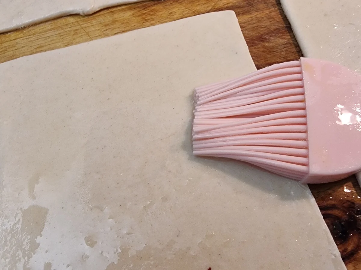 Rezept: Blätterteig-Ecken gefüllt mit Spinat und Feta Bild Nr. 17143 Blätterteig-Ecken gefüllt mit Spinat und Feta - Rezept - Bild Nr. 17143