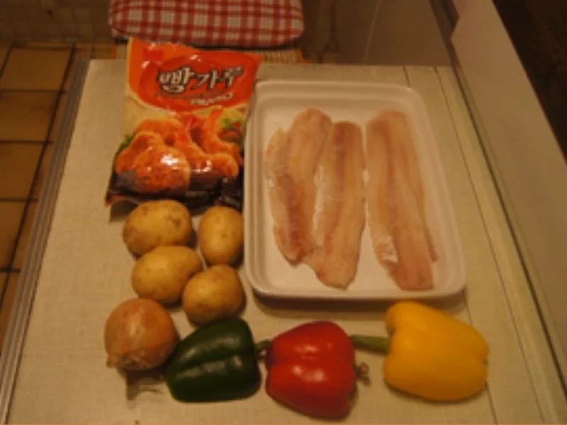 Knusper-Fischfilet mit Zwiebel-Paprika-Gemüse und Kartoffelstampf - Rezept - Bild Nr. 17147