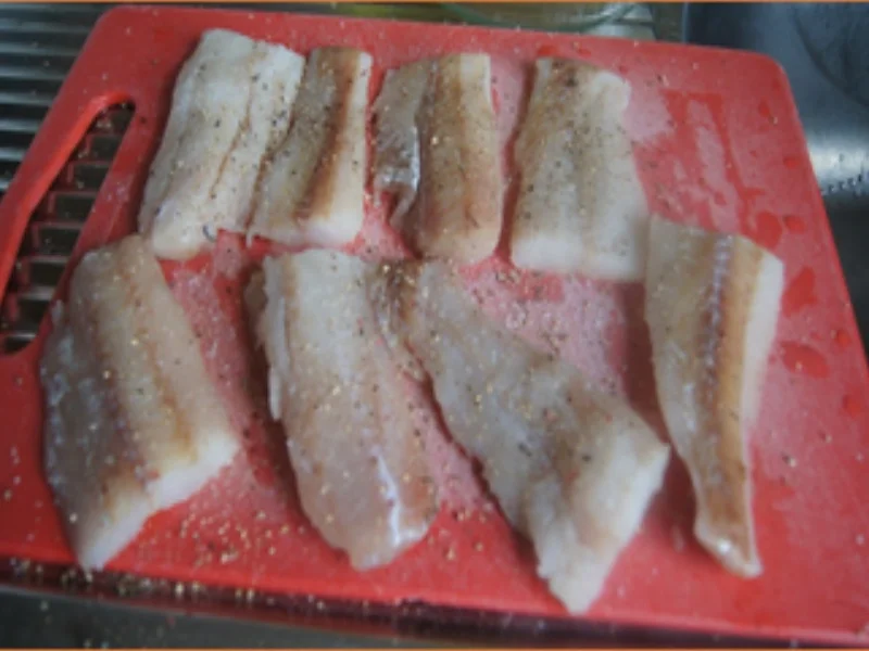 Knusper-Fischfilet mit Zwiebel-Paprika-Gemüse und Kartoffelstampf - Rezept - Bild Nr. 17148