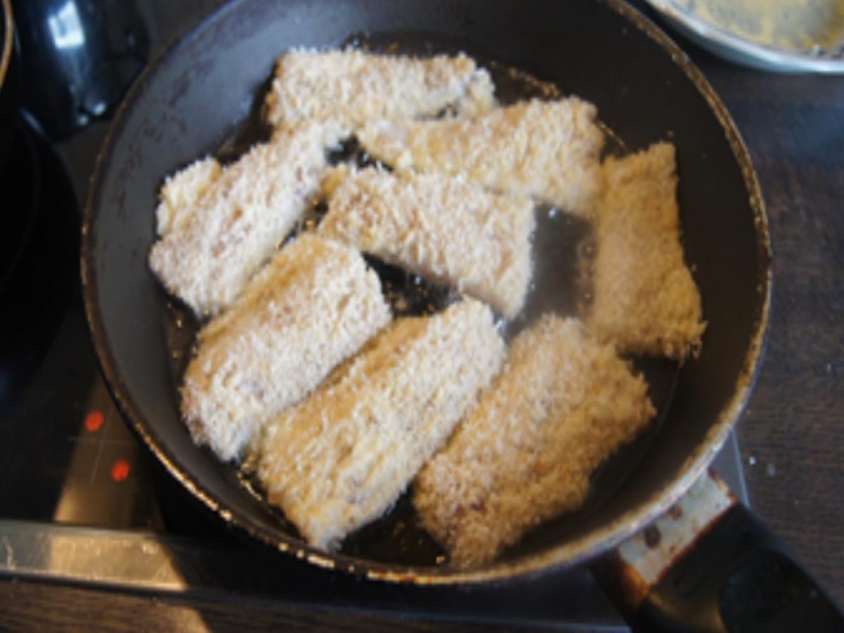 Knusper-Fischfilet mit Zwiebel-Paprika-Gemüse und Kartoffelstampf - Rezept - Bild Nr. 17149