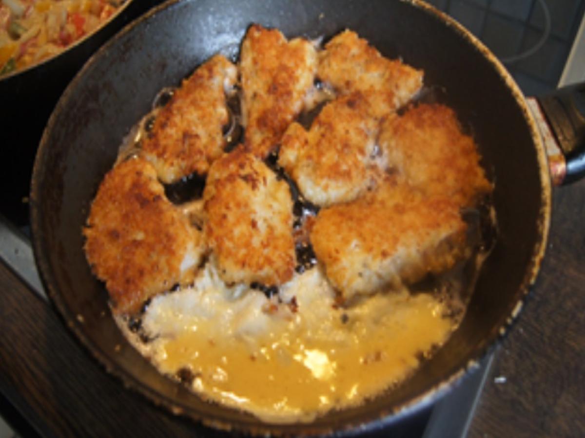 Knusper-Fischfilet mit Zwiebel-Paprika-Gemüse und Kartoffelstampf - Rezept - Bild Nr. 17151