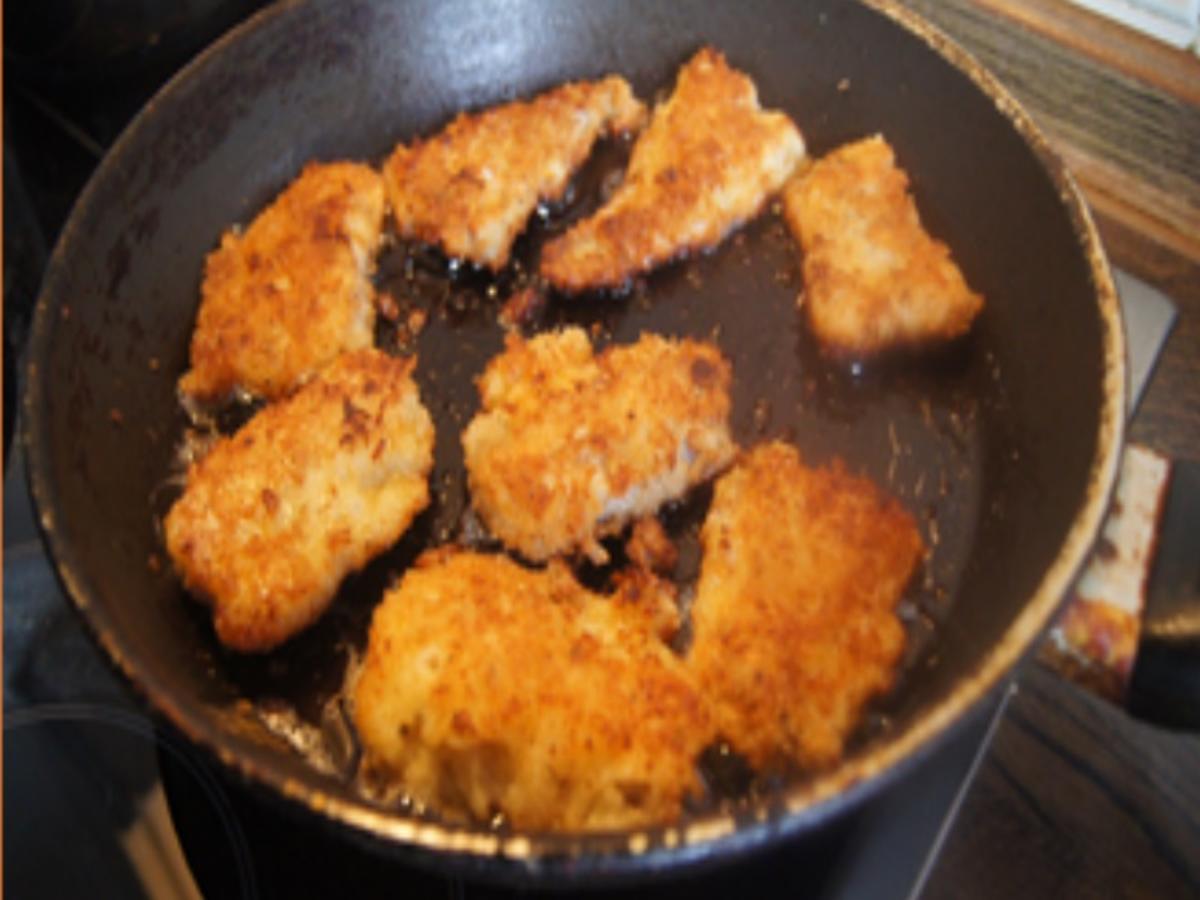 Knusper-Fischfilet mit Zwiebel-Paprika-Gemüse und Kartoffelstampf - Rezept - Bild Nr. 17154