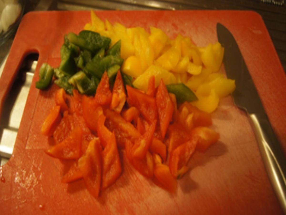 Knusper-Fischfilet mit Zwiebel-Paprika-Gemüse und Kartoffelstampf - Rezept - Bild Nr. 17156