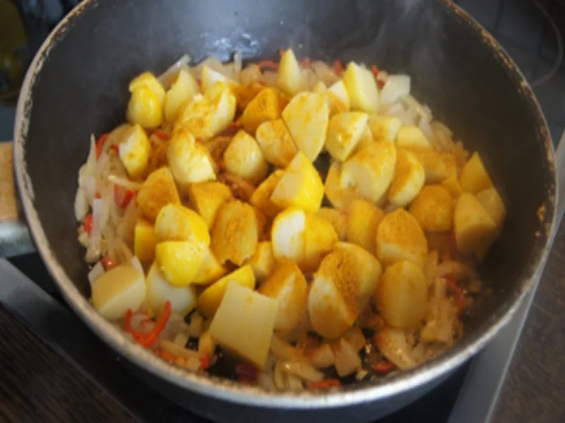 Rezept: Kartoffelcurry mit Mini-Rispentomaten Bild Nr. 17317 Kartoffelcurry mit Mini-Rispentomaten - Rezept - Bild Nr. 17317