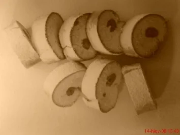 Biskuitrolle mit Himbeer-Sahne-Creme - Rezept