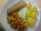 Paniertes Schellfisch-Filet mit Koriander-Rahm-Sauce, Butter-Möhren-Mais-Gemüse und gelben - Rezept - Bild Nr. 17328