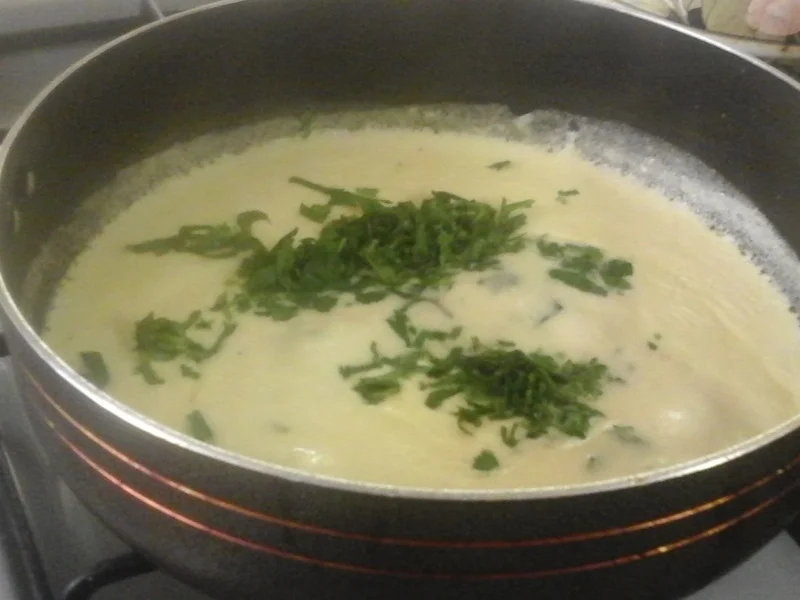 Paniertes Schellfisch-Filet mit Koriander-Rahm-Sauce, Butter-Möhren-Mais-Gemüse und gelben - Rezept - Bild Nr. 17334