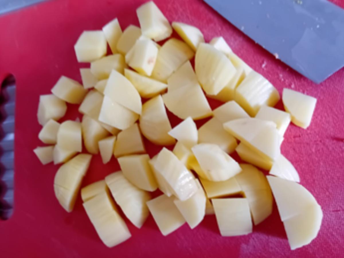 Überbackenes Seelachsfilet mit Tomaten-Mandel-Auflage, Erbsen und Kartoffelstampf - Rezept - Bild Nr. 6