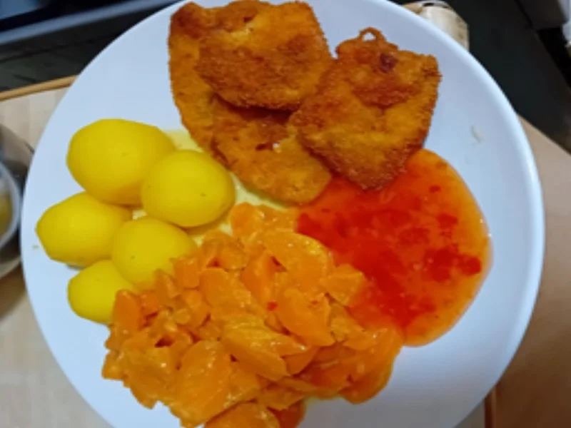 Rezept: Mini-Hähnchenbrustfilet-Schnitzel mit Sahne-Honig-Möhren und Drillingen Bild Nr. 13 Mini-Hähnchenbrustfilet-Schnitzel mit Sahne-Honig-Möhren und Drillingen - Rezept - Bild Nr. 13