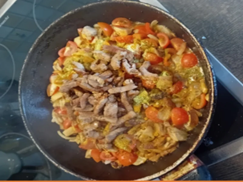 Schweinefilet-Steinpilz-Tomaten-Pfanne mit Naan Brot - Rezept - Bild Nr. 17522