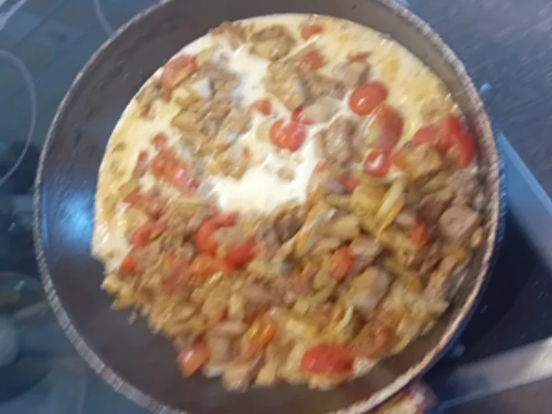 Schweinefilet-Steinpilz-Tomaten-Pfanne mit Naan Brot - Rezept - Bild Nr. 17523