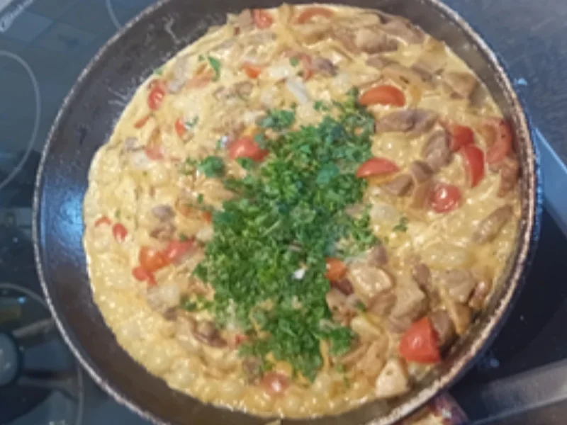 Schweinefilet-Steinpilz-Tomaten-Pfanne mit Naan Brot - Rezept - Bild Nr. 17525