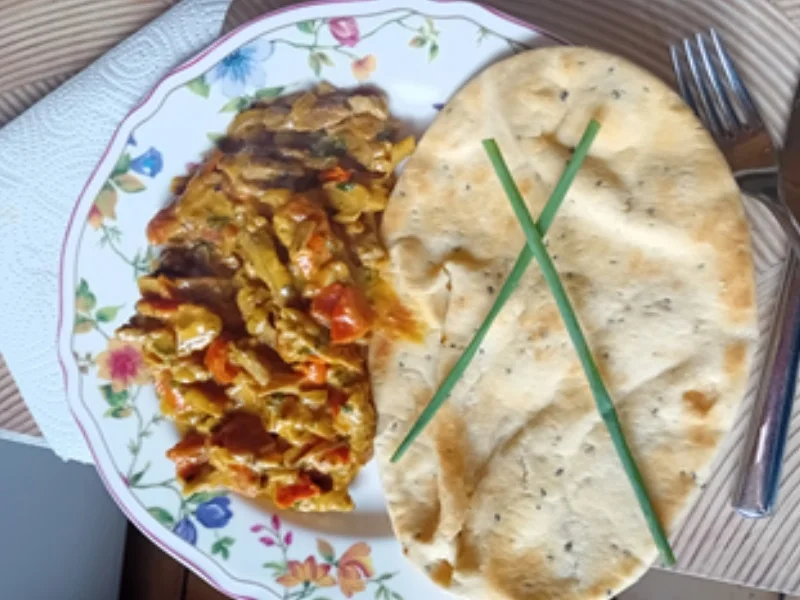 Schweinefilet-Steinpilz-Tomaten-Pfanne mit Naan Brot - Rezept - Bild Nr. 17527