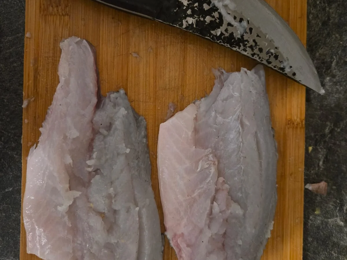 Steierischer Barramundi finkenweder Art mit Ingwer-Mango Beurre Blanc und Petersilienwurze - Rezept - Bild Nr. 17616