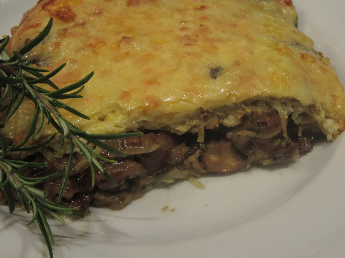 Rezept: Auflauf: Kartoffelpufferauflauf mit Waldpilzen Bild Nr. 2 Auflauf: Kartoffelpufferauflauf mit Waldpilzen - Rezept - Bild Nr. 2