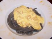 Tilapiafilet auf Tintenfischspaghetti in Safransauce - Rezept