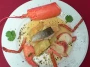 Forellen-Ingwer-Maultaschen und Hummer in Koriandersoße - Rezept