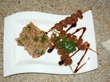 Reispfanne mit Putenspießen - Rezept