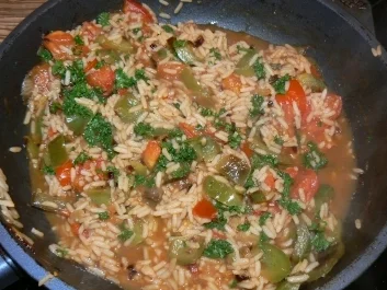 Reispfanne mit Putenspießen - Rezept