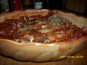 Kammfleisch mit Tomaten und Knoblauch - Rezept