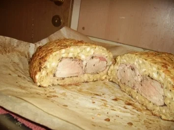 Rezept: Schweinsfilet im Knödelhemd mit Knoblauchsauce Schweinsfilet im Knödelhemd mit Knoblauchsauce - Rezept