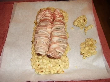 Rezept: Schweinsfilet im Knödelhemd mit Knoblauchsauce Schweinsfilet im Knödelhemd mit Knoblauchsauce - Rezept